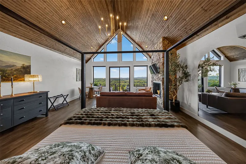 The view from the bed across the lounge to the wall of windows